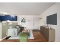 Living room showcasing hardwood floors, modern furniture, and an open layout at 70 N Grant St # 10, Denver, CO 80203
