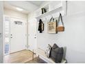 Welcoming entryway with bench, storage, and a bright, airy atmosphere at 1292 W 133Rd Cir, Westminster, CO 80234