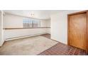 Spacious basement room with tile and carpet flooring at 4730 Carr St, Wheat Ridge, CO 80033