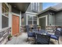 Private patio offers outdoor seating area with a table and chairs, perfect for relaxing at 7140 Simms St # 102, Arvada, CO 80004