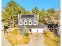 Aerial view of a two-story home featuring a well-manicured lawn and a two-car garage at 3269 W 101St Cir, Westminster, CO 80031