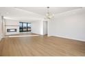 Bright living room with hardwood floors and city views at 2000 E 12Th Ave # 15D, Denver, CO 80206