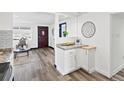 Inviting living area with modern finishes, stylish decor, and ample natural light at 4842 Steele St, Denver, CO 80216