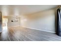 Dining room with hardwood floors and a chandelier at 4266 W Pondview Dr, Littleton, CO 80123