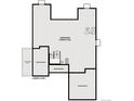 The unfinished lower level is spacious, and includes possible locations for future rooms and bathrooms at 1783 Morgan Dr, Erie, CO 80516