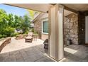 Outdoor patio with comfortable seating and lush landscaping at 6008 S Van Gordon St, Littleton, CO 80127