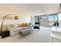 Spacious living area with ample natural light and city views at 955 Eudora St # 708E, Denver, CO 80220