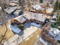 An aerial view of a brown single Gathering home with a long driveway at 4470 W Lakeridge Rd, Denver, CO 80219