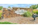 Stone entrance sign for Turnberry community at 13575 E 110Th Ln, Commerce City, CO 80022