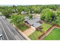Aerial shot of a home with mature trees, spacious yard, and a convenient two-car garage at 4293 Graham Ct, Boulder, CO 80305