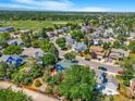 Neighborhood aerial view showcasing the property, green spaces, and residential surroundings at 4257 S Andes Way, Aurora, CO 80013