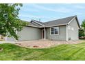 Side view of a house with rock garden at 268 Naples St, Firestone, CO 80520