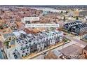 Stunning aerial view of the neighborhood showcases proximity to Sloan's Lake and convenient access to local amenities at 3520 W Connejos Pl # 5, Denver, CO 80204