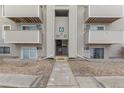 Entrance to building with stairs and landscaping at 10150 E Virginia Ave # 6-305, Denver, CO 80247