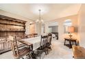 Formal dining room with a wooden table, chairs, and built-in hutch, ideal for Gathering meals at 3150 Lane Ct, Boulder, CO 80305