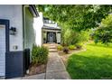 Inviting front entrance with a walkway and decorative landscaping adds curb appeal to this lovely home at 10890 Willow Reed West Cir, Parker, CO 80134