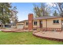 Charming ranch-style home with attached garage and well-maintained landscaping at 60 Yarrow St, Lakewood, CO 80226