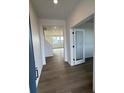 Inviting entryway with wood floors, bright lighting, and an open floor plan at 2145 S Ider Way, Aurora, CO 80018