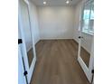 Bright office space with hardwood floors and plenty of natural light from large windows at 2145 S Ider Way, Aurora, CO 80018