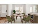 Staged dining area featuring a round wooden table and plenty of natural light at 8836 Waco Ct, Commerce City, CO 80022