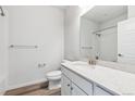 Clean, well-lit bathroom features a modern vanity, with neutral countertops, sink, and bath tub at 485 Interlocken Blvd # 209, Broomfield, CO 80021