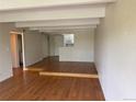 Inviting living room featuring hardwood floors and an open layout, perfect for entertaining and relaxation at 8060 E Girard Ave # 504, Denver, CO 80231