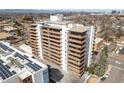 Mid-rise building with lots of balconies and solar panels on the rooftop at 4570 E Yale Ave # 507, Denver, CO 80222