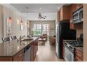 Well-equipped kitchen seamlessly connects with a cozy living area, perfect for entertaining and everyday living at 1975 Grant St # 501, Denver, CO 80203