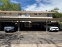 Carport parking with covered parking spots in front of the townhome at 1967 S Oakland Way, Aurora, CO 80014