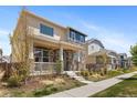 Charming two-story home with a stone facade and welcoming front porch at 868 N Quatar St, Aurora, CO 80018