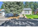 Beautifully landscaped single story home with a well-manicured front yard at 4782 E Costilla Ave, Centennial, CO 80122