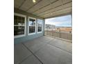 Enjoy serene outdoor views from this covered porch, a perfect relaxation spot at 191 Washington St, Erie, CO 80516