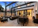 Outdoor area with dining table, fire pit and comfortable seating making it ideal for entertainment at 562 Steele St, Denver, CO 80206