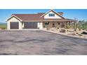 Lovely home with attached garage and expansive driveway, providing ample parking space at 4075 Merada Ct, Franktown, CO 80116