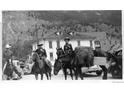 Vintage image featuring horses and riders in front of a building with a mountain backdrop at 614 Rose St, Georgetown, CO 80444