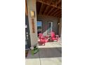 Cozy front porch featuring comfortable seating, a stylish address display and a welcoming ambiance at 10150 Belvedere Loop, Lone Tree, CO 80124
