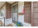 Close-up of the front door with decorative metal security gate at 502 Nile St, Aurora, CO 80010
