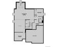 Basement floor plan features recreation room, bar, bedroom, bathroom and unfinished storage spaces at 5578 Tamarack Ave, Firestone, CO 80504
