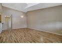 Bright living room features hardwood floors and an open floor plan at 1343 Villa Grv, Monument, CO 80132
