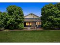 Private backyard with lush greenery providing a serene and secluded outdoor space at 7126 E 162Nd Ct, Brighton, CO 80602