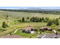 Sprawling estate with lush green surroundings offering privacy and natural beauty at 8625 Eagle Moon Way, Parker, CO 80134