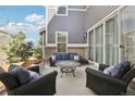 Relaxing outdoor patio with comfortable seating, perfect for entertaining or enjoying quiet moments at 25548 E Fair Dr, Aurora, CO 80016