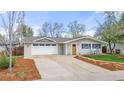 Delightful single-story home with an attached garage, and a well-kept lawn with attractive curb appeal at 712 S Longmont Ave, Lafayette, CO 80026