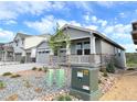 Charming single-Gathering home featuring a 2-car garage, covered porch, and professionally landscaped front yard at 3967 Descent St, Castle Rock, CO 80108