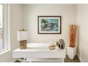 Bright office space with white desk, modern decor, and natural light at 3408 W 18Th Ave, Denver, CO 80204