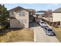 Inviting two-story home with well-maintained lawn, driveway, and attached garage, perfect for a Gathering at 3699 S Killarney St, Aurora, CO 80013