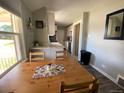 Inviting eat-in kitchen with granite countertops and plenty of natural light at 3993 Haddon Rd, Denver, CO 80205