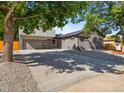 Attractive curb appeal featuring a remodeled home with a spacious driveway at 181 E 108Th Ave, Northglenn, CO 80233