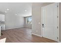 Bright living area with wood flooring, recessed lights, and large windows offering great natural light at 1525 E 3Rd Ave, Longmont, CO 80501