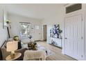 Inviting living room with natural light, a comfortable sofa, and modern decor accents at 4910 W 34Th Ave, Denver, CO 80212